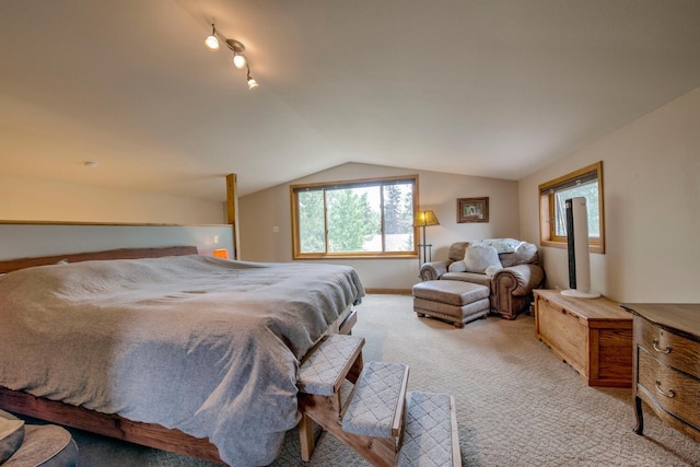 277 G Rd, Silverthorne, CO 80498 - bedroom with light colored carpet, lofted ceiling, and track lighting
