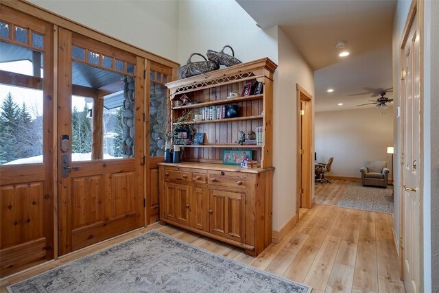 1064 Steamboat Blvd, Steamboat Springs, CO 80487 - bar with recessed lighting, light wood finished floors, baseboards, and a ceiling fan