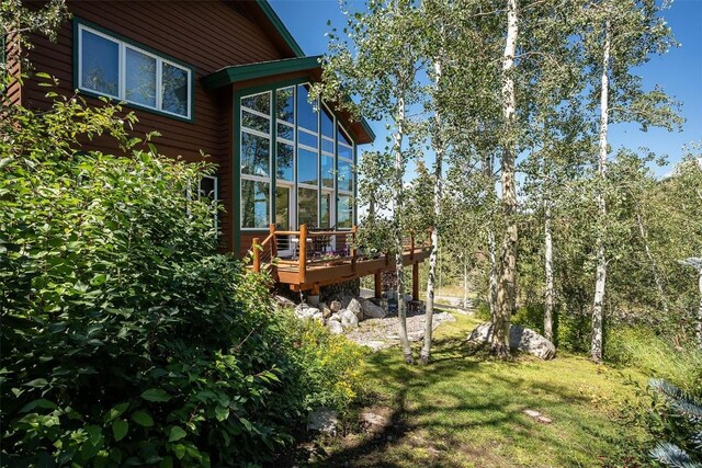 1064 Steamboat Blvd, Steamboat Springs, CO 80487 - view of yard featuring a deck