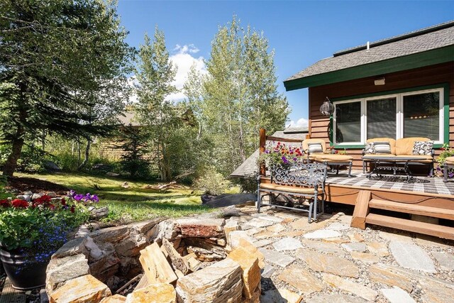 1064 Steamboat Blvd, Steamboat Springs, CO 80487 - exterior space featuring an outdoor living space and a wooden deck
