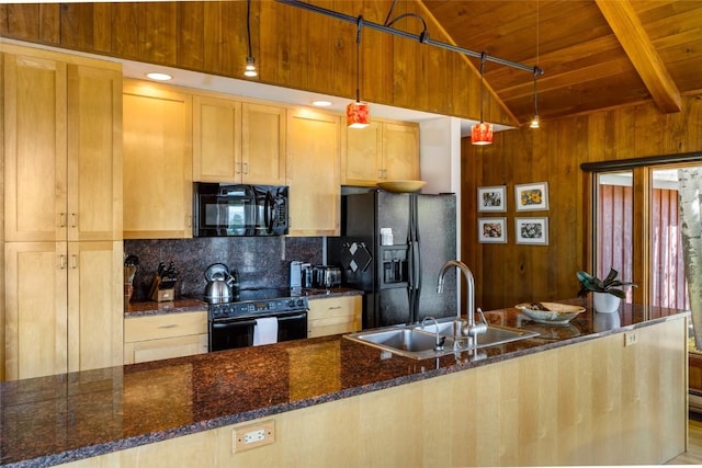 kitchen with pendant lighting, black appliances, sink, dark stone countertops, and wood ceiling