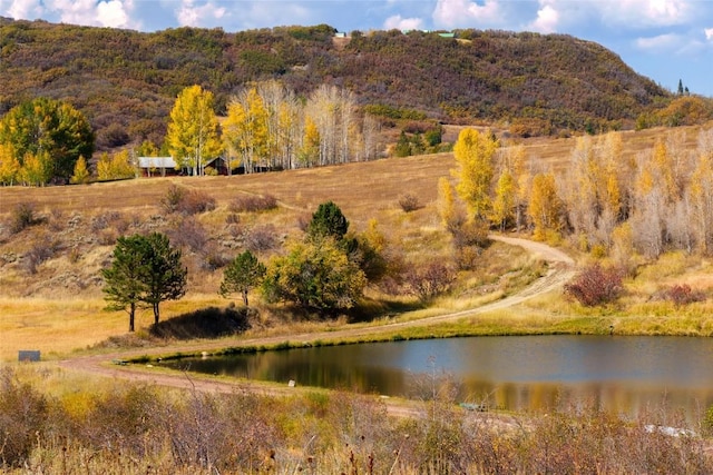 mountain view featuring a water view