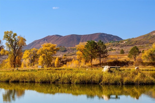 mountain view featuring a water view