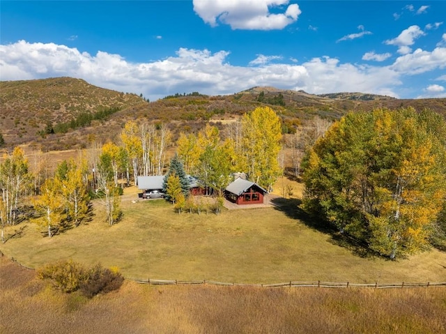 birds eye view of property featuring a mountain view and a rural view