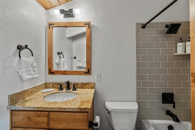 2275 Storm Meadows Dr Unit 63, Steamboat Springs, CO 80487 - bathroom with vanity, toilet, and washtub / shower combination