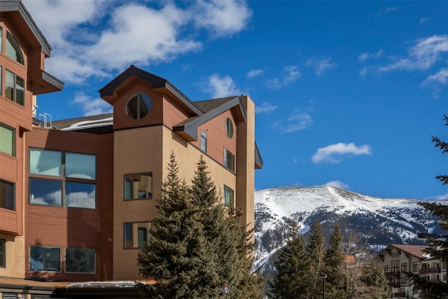 45 Beeler Pl Unit 301, Copper Mountain, CO 80443 - view of building exterior featuring a mountain view