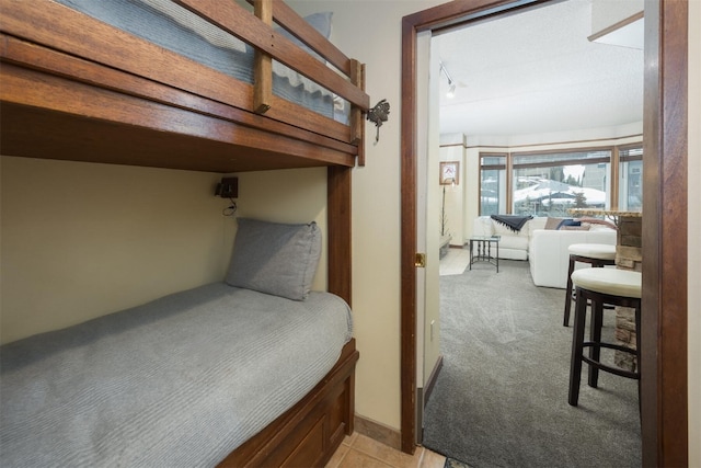 45 Beeler Pl Unit 301, Copper Mountain, CO 80443 - bedroom with light colored carpet
