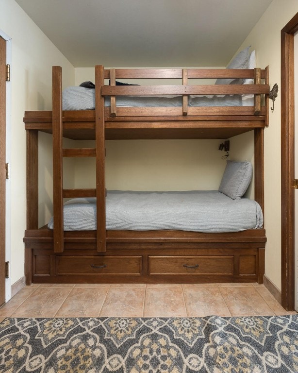 45 Beeler Pl Unit 301, Copper Mountain, CO 80443 - unfurnished bedroom featuring light tile patterned floors