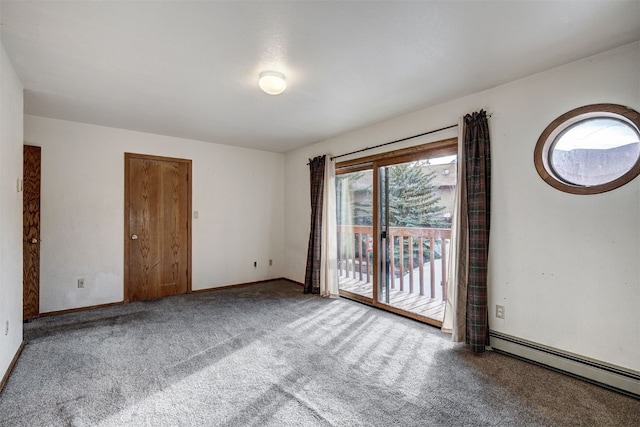 716 Lagoon Dr Unit D, Frisco, CO 80443 - empty room featuring baseboards, carpet, and a baseboard radiator