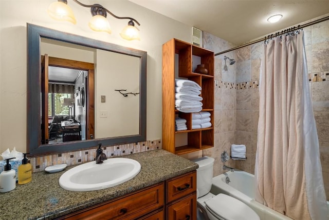 full bathroom with toilet, vanity, and shower / bathtub combination with curtain