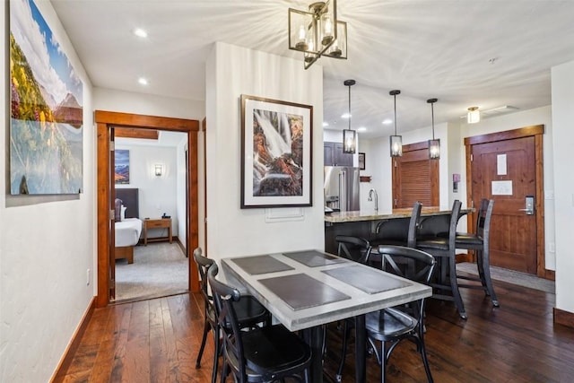 1521 Ski Hill Rd Unit 8312, Breckenridge, CO 80424 - dining space featuring dark wood-style flooring, recessed lighting, and a desk