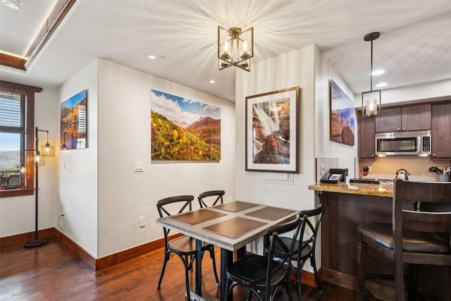 1521 Ski Hill Rd Unit 8312, Breckenridge, CO 80424 - dining room featuring dark wood-style flooring, a chandelier, and recessed lighting