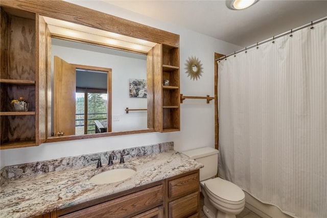 91200 Ryan Gulch Rd Unit 91222, Silverthorne, CO 80498 - bathroom featuring toilet, vanity, and a shower with curtain