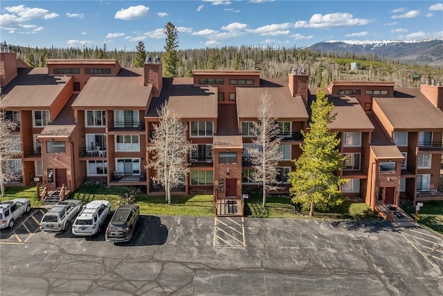 91200 Ryan Gulch Rd Unit 91222, Silverthorne, CO 80498 - view of property featuring uncovered parking and a mountain view