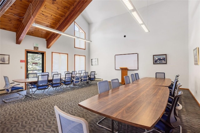 91200 Ryan Gulch Rd Unit 91222, Silverthorne, CO 80498 - dining room featuring carpet flooring, high vaulted ceiling, beamed ceiling, baseboards, and wood ceiling