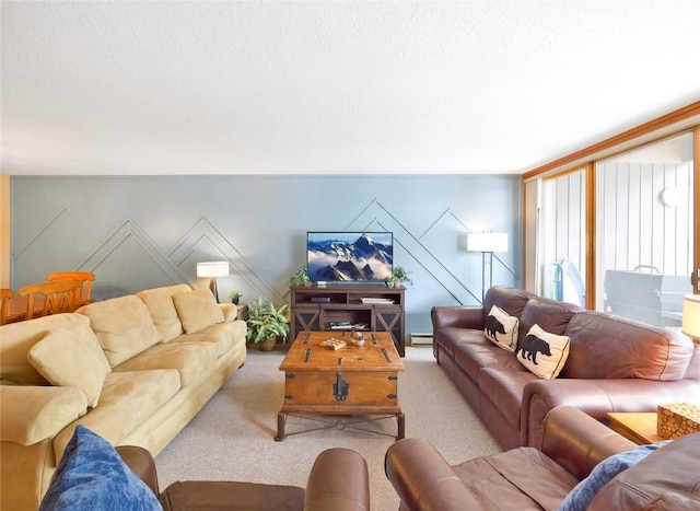 living room featuring light carpet, a textured ceiling, and baseboard heating