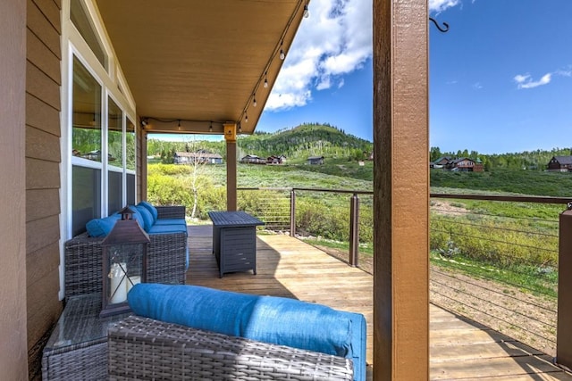 26870 Beaver Canyon Dr, Clark, CO 80428 - wooden deck featuring a mountain view