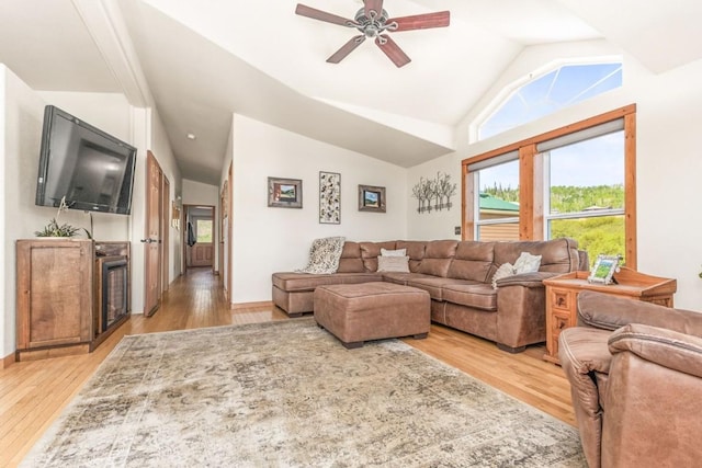 26870 Beaver Canyon Dr, Clark, CO 80428 - living room featuring vaulted ceiling, ceiling fan, and light wood-style floors