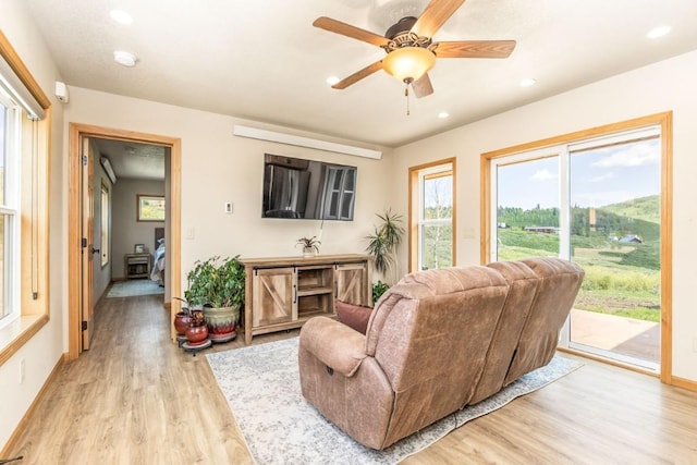 26870 Beaver Canyon Dr, Clark, CO 80428 - living area with light wood-type flooring, recessed lighting, baseboards, and a ceiling fan