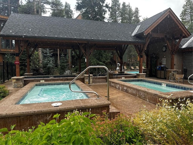 815 Columbine Rd Unit 22, Breckenridge, CO 80424 - community pool featuring a hot tub