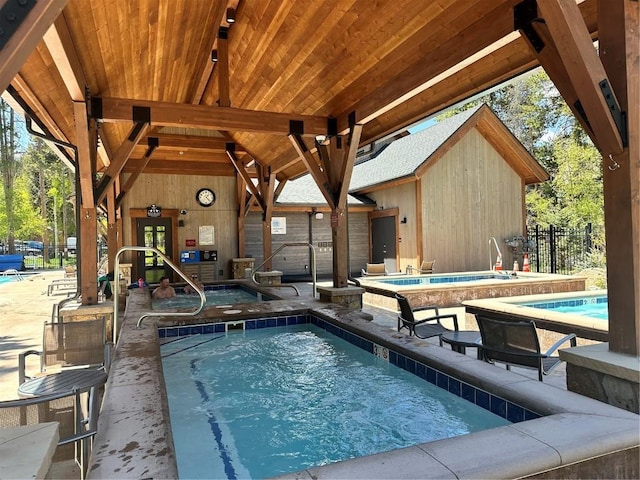815 Columbine Rd Unit 22, Breckenridge, CO 80424 - indoor community pool with a hot tub and a patio area
