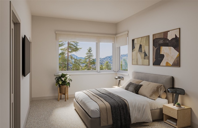 bedroom featuring a mountain view and light carpet