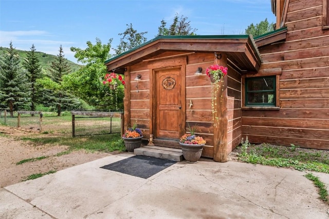50035 Moon Hill Dr, Steamboat Springs, CO 80487 - view of exterior entry with a patio