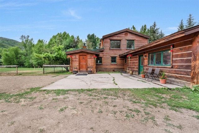 50035 Moon Hill Dr, Steamboat Springs, CO 80487 - back of property featuring a patio area