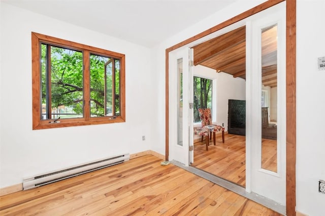 50035 Moon Hill Dr, Steamboat Springs, CO 80487 - empty room featuring baseboard heating and light wood-type flooring