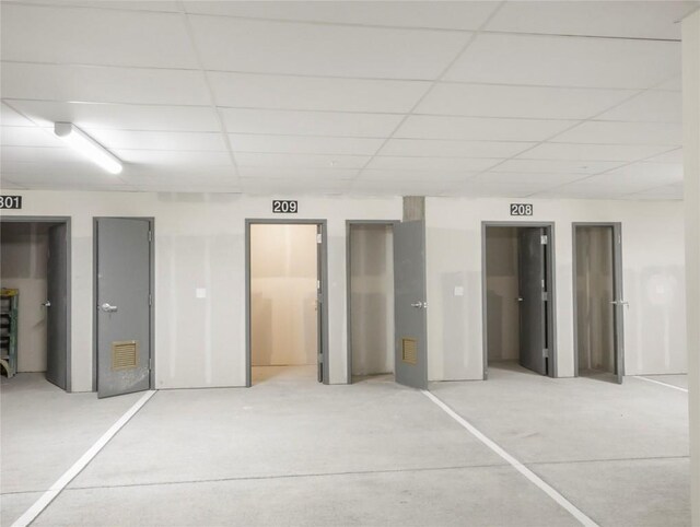 unfurnished bedroom featuring a paneled ceiling