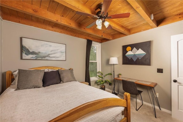 2300 Lodge Pole Cir Unit 107, Silverthorne, CO 80498 - bedroom featuring wooden ceiling with exposed beams, light carpet, and baseboards