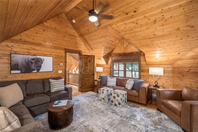 486 Sage Creek Canyon Dr, Silverthorne, CO 80498 - living room with wood ceiling, vaulted ceiling, wood walls, a ceiling fan, and wood finished floors