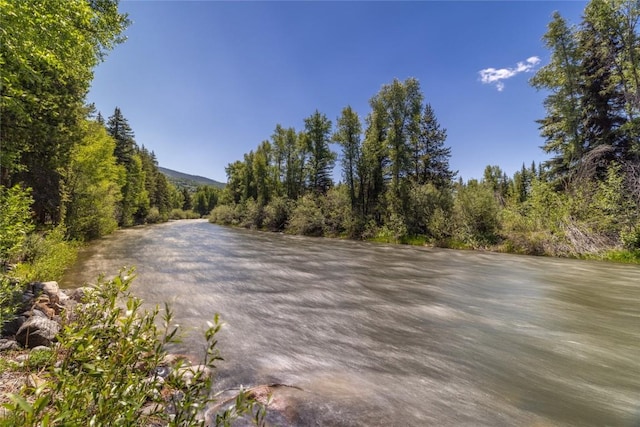 486 Sage Creek Canyon Dr, Silverthorne, CO 80498 - view of street featuring a wooded view