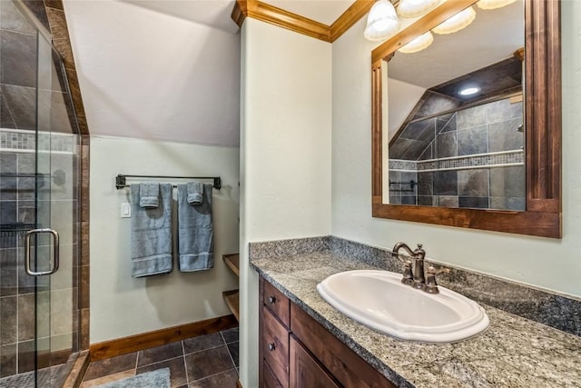 486 Sage Creek Canyon Dr, Silverthorne, CO 80498 - bathroom featuring vanity, a shower stall, crown molding, tile patterned floors, and lofted ceiling