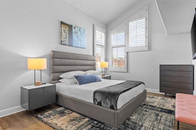 1724 Ski Time Square Dr Unit R6, Steamboat Springs, CO 80487 - bedroom with hardwood / wood-style flooring and baseboards