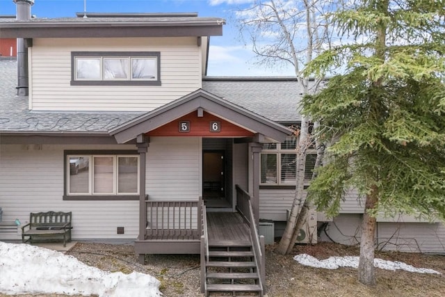 1724 Ski Time Square Dr Unit R6, Steamboat Springs, CO 80487 - view of front facade featuring a shingled roof