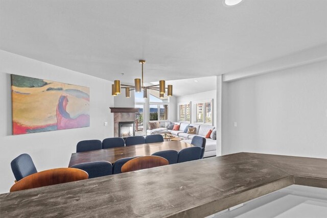 1724 Ski Time Square Dr Unit R6, Steamboat Springs, CO 80487 - dining room featuring a tile fireplace