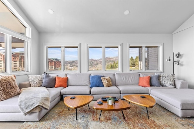 1724 Ski Time Square Dr Unit R6, Steamboat Springs, CO 80487 - living room with healthy amount of natural light, vaulted ceiling, and recessed lighting