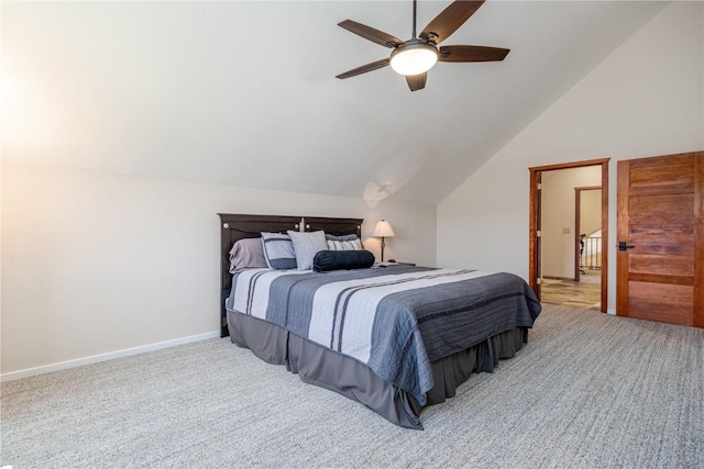 carpeted bedroom featuring ceiling fan, lofted ceiling, and baseboards