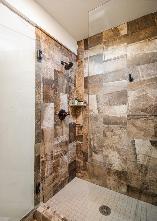 bathroom featuring a stall shower