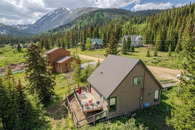 46 Mcdill Rd, Breckenridge, CO 80424 - aerial view of property and surrounding area with a forest and a mountain backdrop