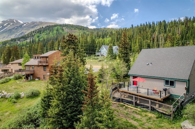 46 Mcdill Rd, Breckenridge, CO 80424 - aerial view of property and surrounding area with a heavily wooded area and a mountain backdrop