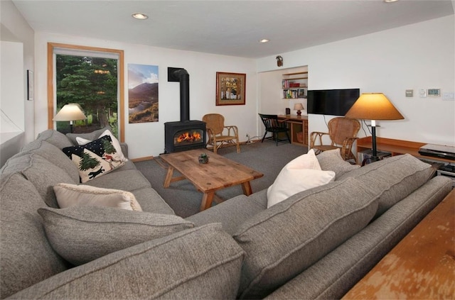 46 Mcdill Rd, Breckenridge, CO 80424 - carpeted living area with a wood stove and recessed lighting