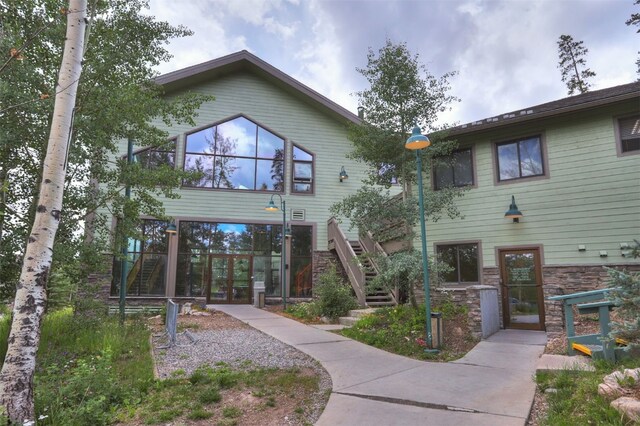 8500 Ryan Gulch Rd Unit G2, Wildernest, CO 80498 - view of front of property with stairway and stone siding