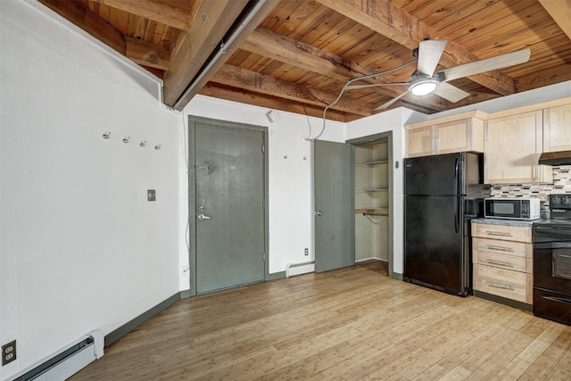 8500 Ryan Gulch Rd Unit G2, Wildernest, CO 80498 - kitchen featuring black appliances, a baseboard heating unit, wood ceiling with exposed beams, light brown cabinets, and a ceiling fan