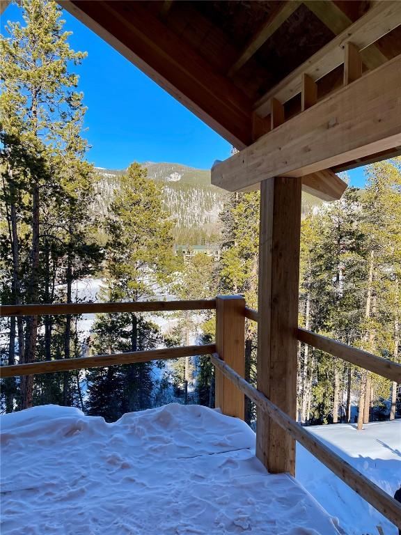 0117 Lake Ridge Cir Unit 1864, Keystone, CO 80435 - snow covered deck with a mountain view