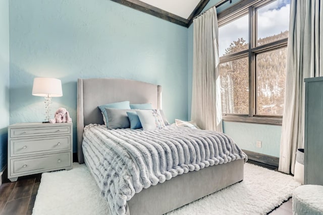0117 Lake Ridge Cir Unit 1864, Keystone, CO 80435 - bedroom with vaulted ceiling and multiple windows
