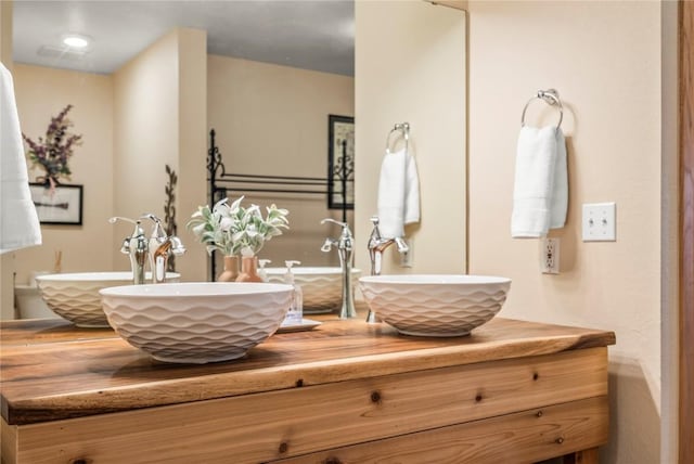 full bath featuring double vanity