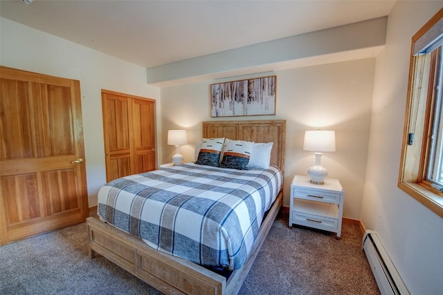 23110 US Highway 6 Unit 319, Keystone, CO 80435 - bedroom with carpet, a baseboard heating unit, and a closet