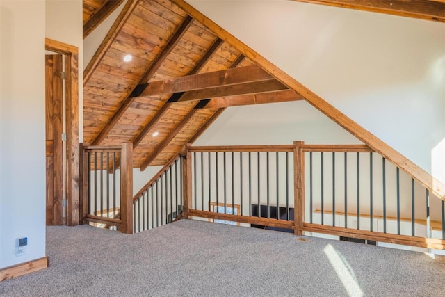 bonus room featuring vaulted ceiling with beams, wooden ceiling, and carpet flooring